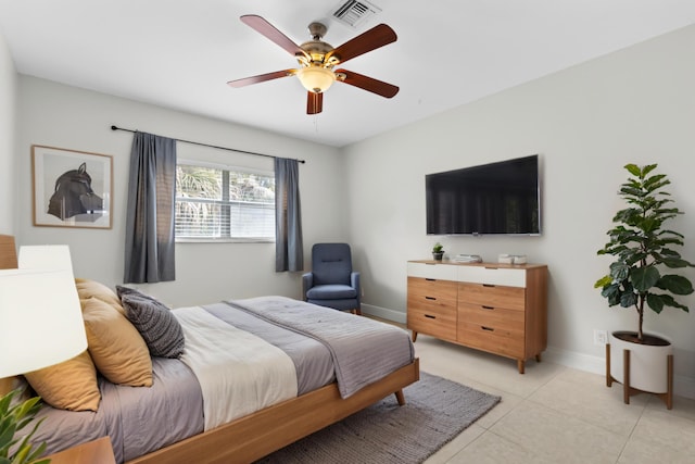 1920 Palmland Dr Unit C, Boynton Beach, FL 33436 - bedroom with baseboards, light tile patterned floors, and a ceiling fan