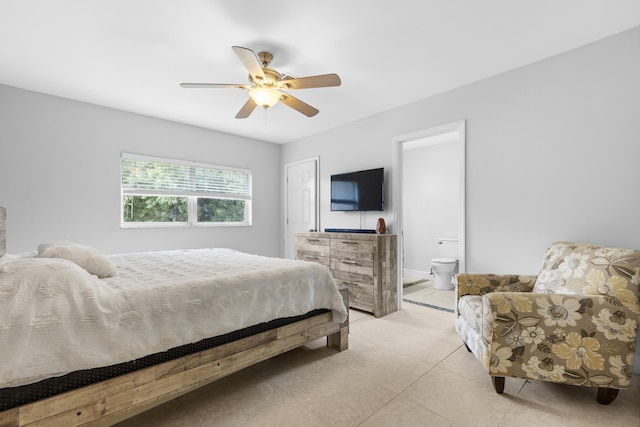 1920 Palmland Dr Unit C, Boynton Beach, FL 33436 - bedroom with ensuite bathroom, a ceiling fan, and light tile patterned flooring