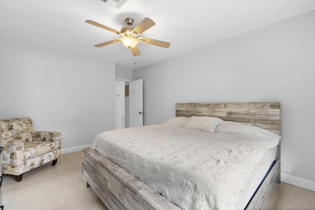 1920 Palmland Dr Unit C, Boynton Beach, FL 33436 - bedroom with baseboards, ceiling fan, and light tile patterned floors