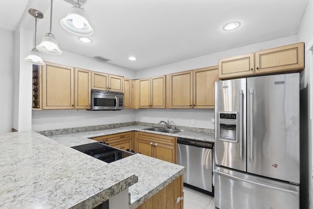 1920 Palmland Dr Unit C, Boynton Beach, FL 33436 - kitchen with stainless steel appliances, a sink, light countertops, pendant lighting, and recessed lighting
