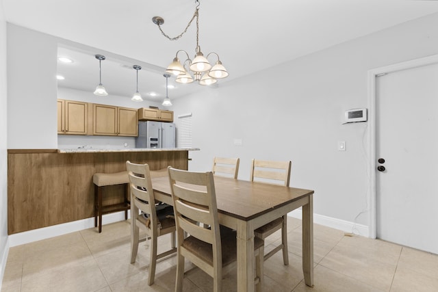 1920 Palmland Dr Unit C, Boynton Beach, FL 33436 - dining room with a chandelier, light tile patterned flooring, recessed lighting, and baseboards