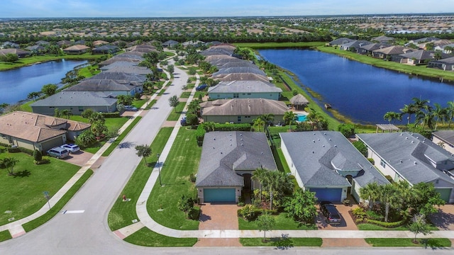 11416 SW Lake Park Dr, Port Saint Lucie, FL 34987 - aerial view of residential area featuring a nearby body of water