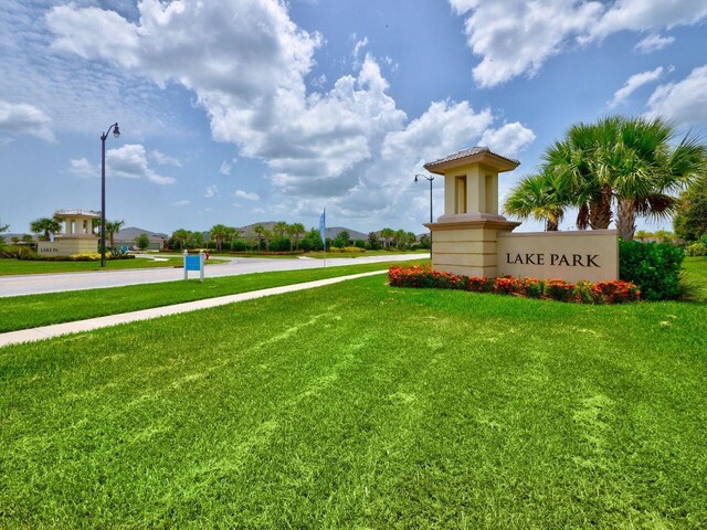 11416 SW Lake Park Dr, Port Saint Lucie, FL 34987 - community sign with a yard