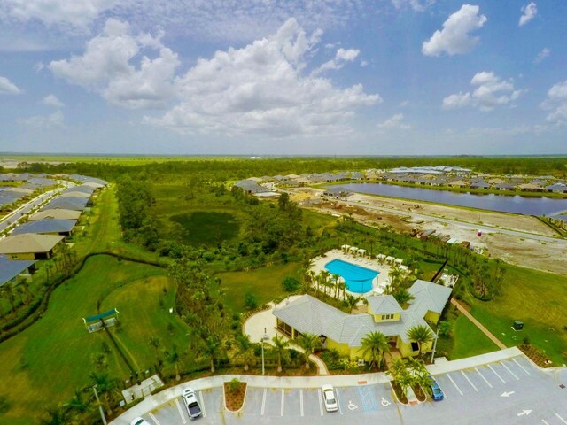 11416 SW Lake Park Dr, Port Saint Lucie, FL 34987 - drone / aerial view of a large body of water and a pool