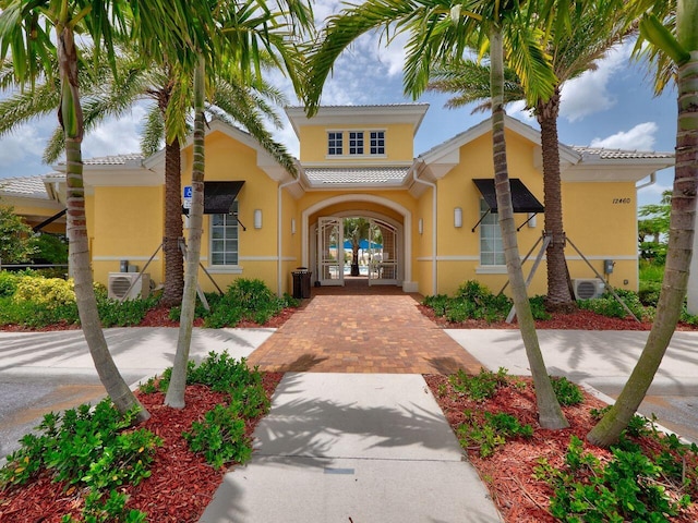 11416 SW Lake Park Dr, Port Saint Lucie, FL 34987 - view of building exterior featuring a cooling unit