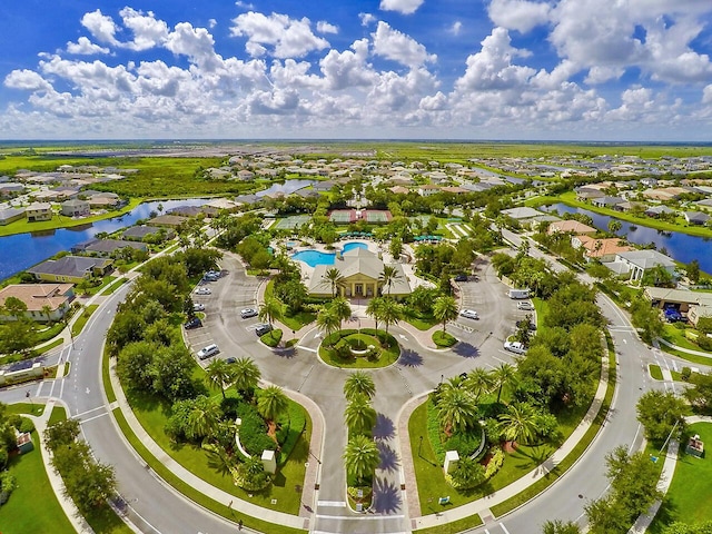 11416 SW Lake Park Dr, Port Saint Lucie, FL 34987 - aerial perspective of suburban area with a large body of water and a pool