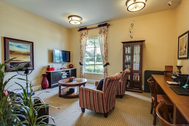 11416 SW Lake Park Dr, Port Saint Lucie, FL 34987 - living room with an office area, baseboards, wallpapered walls, and light colored carpet
