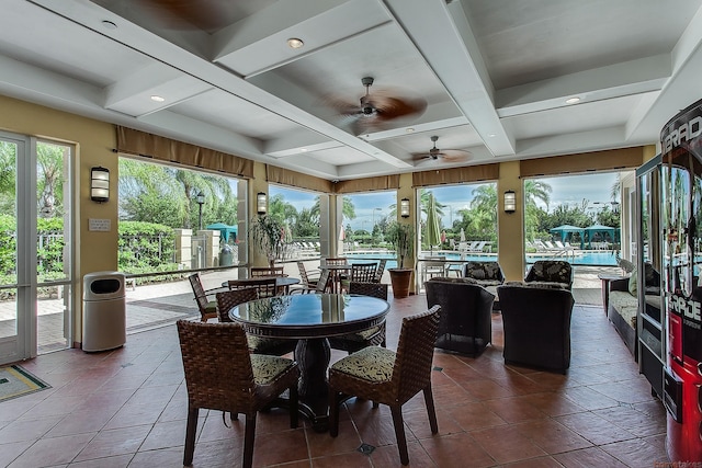 11416 SW Lake Park Dr, Port Saint Lucie, FL 34987 - sunroom with coffered ceiling, beamed ceiling, tile patterned floors, and recessed lighting