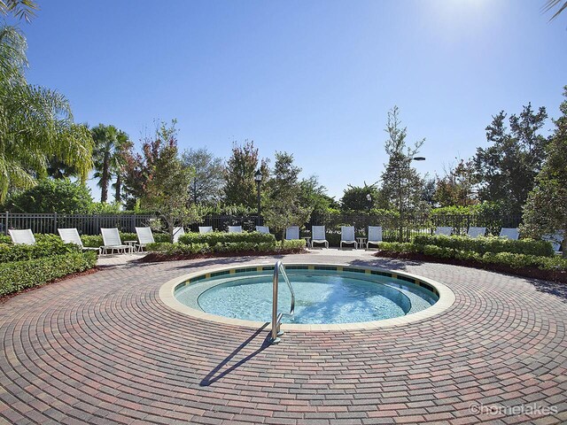 11416 SW Lake Park Dr, Port Saint Lucie, FL 34987 - view of pool with fence and a patio area