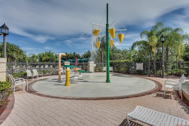 11416 SW Lake Park Dr, Port Saint Lucie, FL 34987 - view of jungle gym with fence