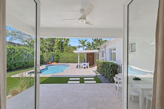 5830 SW 51st Ter, Miami, FL 33155 - view of swimming pool with a patio area, ceiling fan, and a fenced backyard