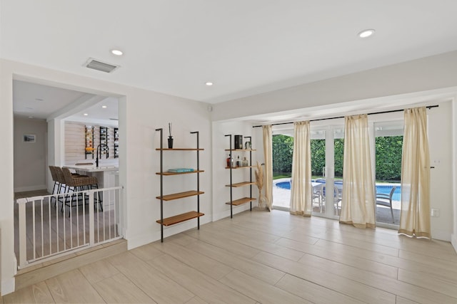 5830 SW 51st Ter, Miami, FL 33155 - spare room featuring wood finished floors, recessed lighting, and baseboards