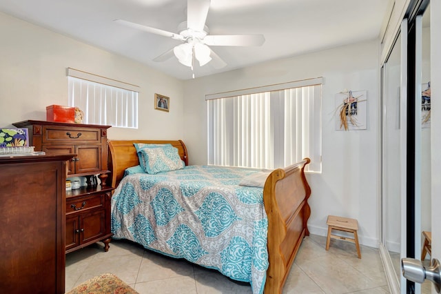2425 S Florida Mango Rd, West Palm Beach, FL 33406 - bedroom with light tile patterned floors, a closet, and ceiling fan