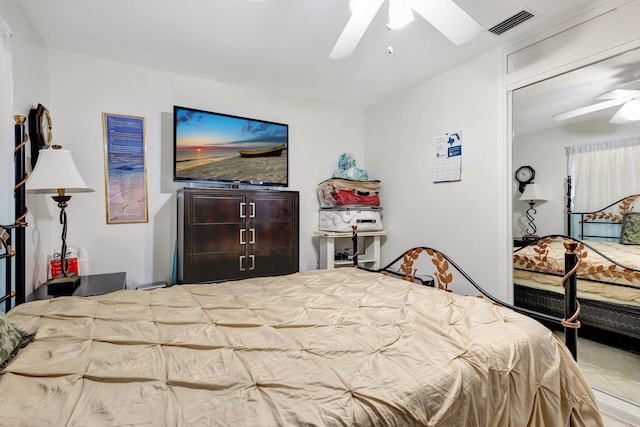 2425 S Florida Mango Rd, West Palm Beach, FL 33406 - tiled bedroom featuring a ceiling fan