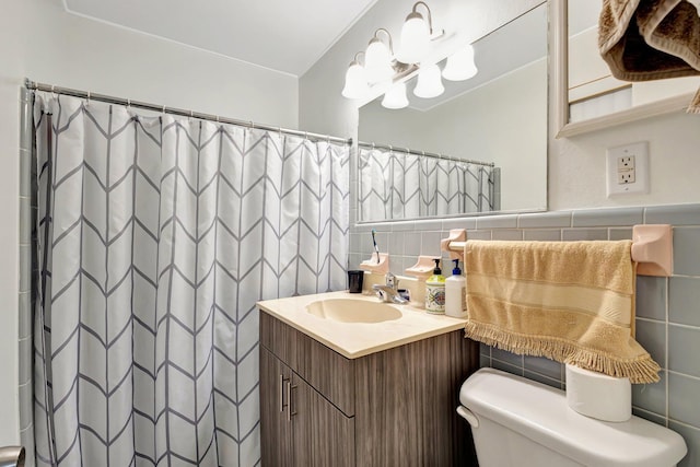 2425 S Florida Mango Rd, West Palm Beach, FL 33406 - bathroom featuring tile walls, toilet, vanity, a chandelier, and curtained shower