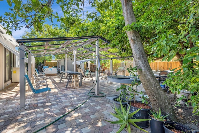 2425 S Florida Mango Rd, West Palm Beach, FL 33406 - view of patio featuring a fenced backyard and a pergola