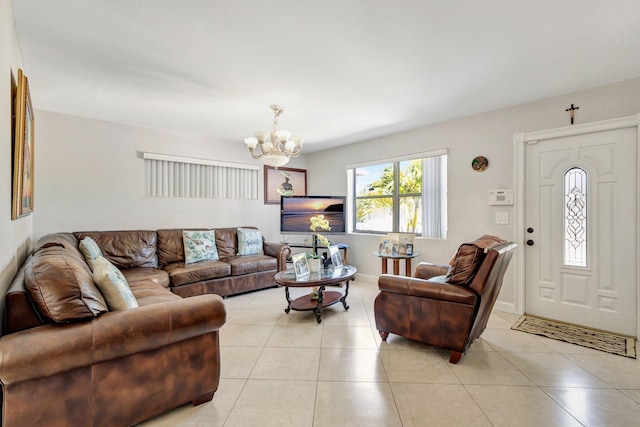 2425 S Florida Mango Rd, West Palm Beach, FL 33406 - living room featuring a chandelier and light tile patterned floors