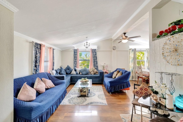 living room featuring wood finished floors, ceiling fan, and ornamental molding