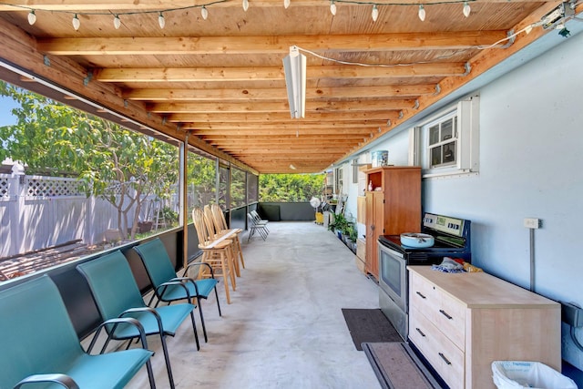 view of patio / terrace featuring fence