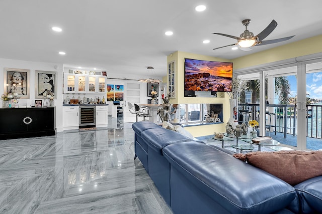 1537 E Hillsboro Blvd Unit 341, Deerfield Beach, FL 33441 - living area featuring wine cooler, bar, recessed lighting, and a ceiling fan