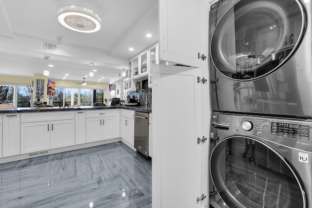 1537 E Hillsboro Blvd Unit 341, Deerfield Beach, FL 33441 - laundry room with stacked washing machine and dryer, a ceiling fan, and recessed lighting