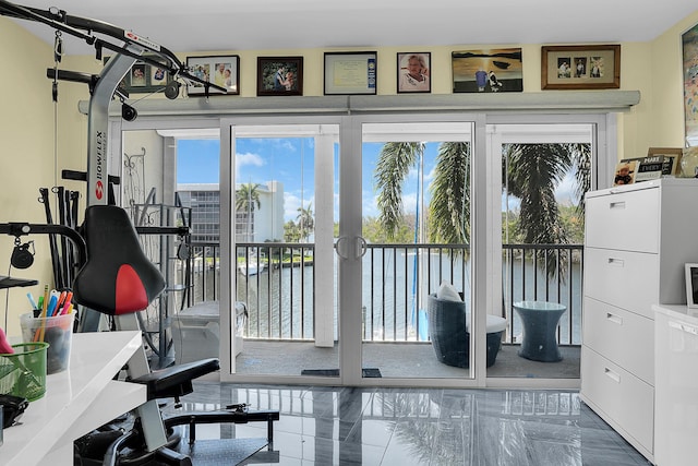1537 E Hillsboro Blvd Unit 341, Deerfield Beach, FL 33441 - exercise room featuring a water view and marble finish flooring