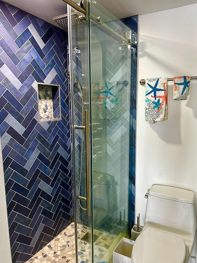 1537 E Hillsboro Blvd Unit 341, Deerfield Beach, FL 33441 - bathroom with a stall shower and toilet