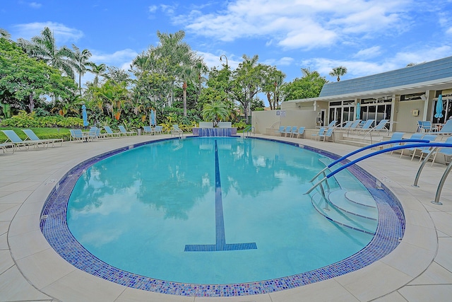 1537 E Hillsboro Blvd Unit 341, Deerfield Beach, FL 33441 - community pool featuring a patio area