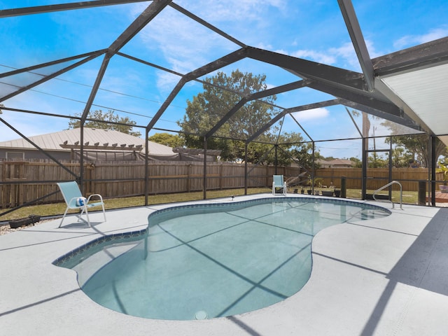 1138 SW Gardena Ave, Port Saint Lucie, FL 34953 - view of pool with a fenced backyard, a patio, and a lanai