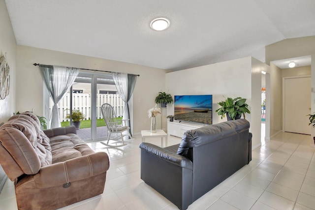 1266 NW 126th Ter, Sunrise, FL 33323 - living room with light tile patterned floors and vaulted ceiling