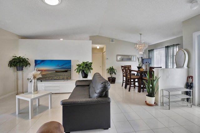 1266 NW 126th Ter, Sunrise, FL 33323 - living area with a chandelier, vaulted ceiling, a textured ceiling, light tile patterned flooring, and baseboards