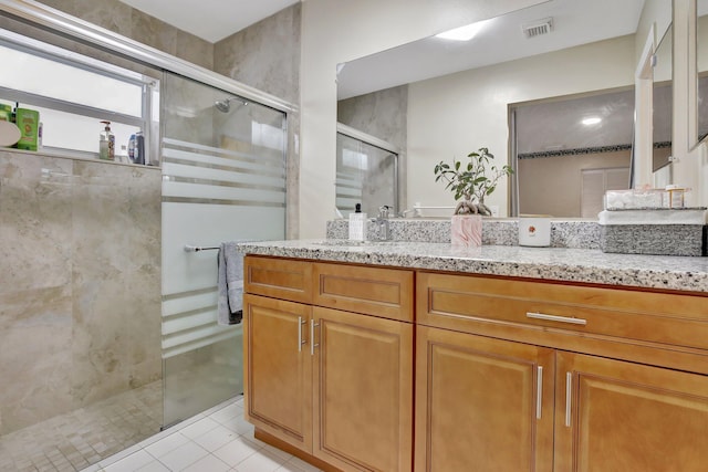 1266 NW 126th Ter, Sunrise, FL 33323 - bathroom featuring a walk in shower, tile patterned flooring, and vanity
