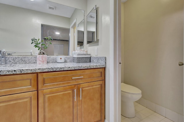1266 NW 126th Ter, Sunrise, FL 33323 - bathroom featuring toilet, tile patterned floors, and vanity