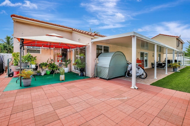 1266 NW 126th Ter, Sunrise, FL 33323 - view of patio with a gazebo and fence