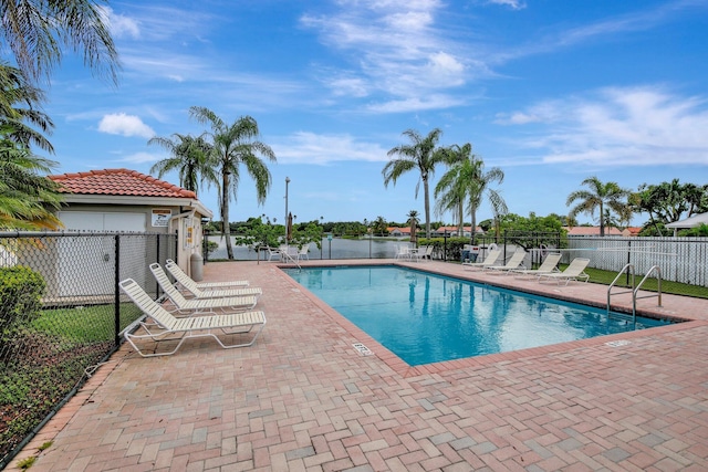 1266 NW 126th Ter, Sunrise, FL 33323 - community pool with fence and a patio