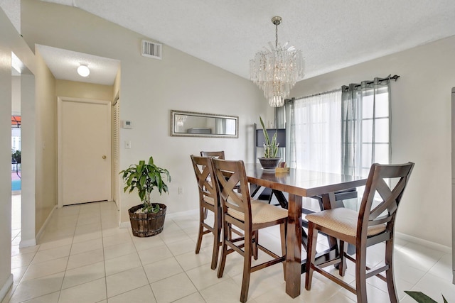 1266 NW 126th Ter, Sunrise, FL 33323 - dining room with baseboards, a chandelier, a textured ceiling, and light tile patterned floors