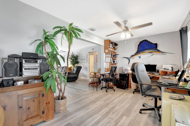 2115 SW 22nd St, Boynton Beach, FL 33426 - home office featuring wood finished floors, ceiling fan, and baseboards