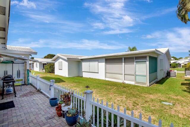 2115 SW 22nd St, Boynton Beach, FL 33426 - view of patio / terrace featuring central air condition unit