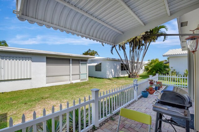 2115 SW 22nd St, Boynton Beach, FL 33426 - view of patio / terrace with area for grilling