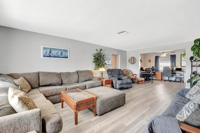 2115 SW 22nd St, Boynton Beach, FL 33426 - living room with a desk, light wood-style flooring, and a ceiling fan