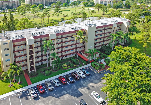 3810 Via Poinciana Unit 401, Lake Worth, FL 33467 - drone / aerial view of apartment complex and a golf club