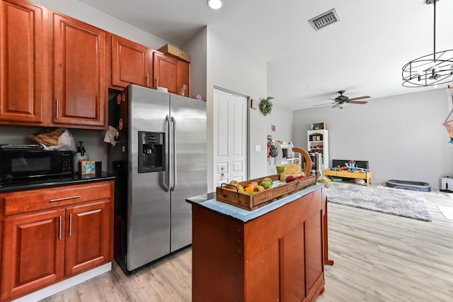 561 Peppergrass Run, Royal Palm Beach, FL 33411 - kitchen with stainless steel fridge with ice dispenser, black microwave, light wood-type flooring, a kitchen island, and a ceiling fan