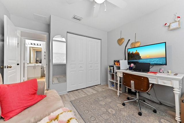 561 Peppergrass Run, Royal Palm Beach, FL 33411 - home office with wood finished floors, a ceiling fan, and baseboards