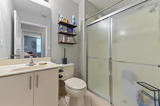 561 Peppergrass Run, Royal Palm Beach, FL 33411 - full bathroom with a shower with door, vanity, toilet, and tile patterned floors