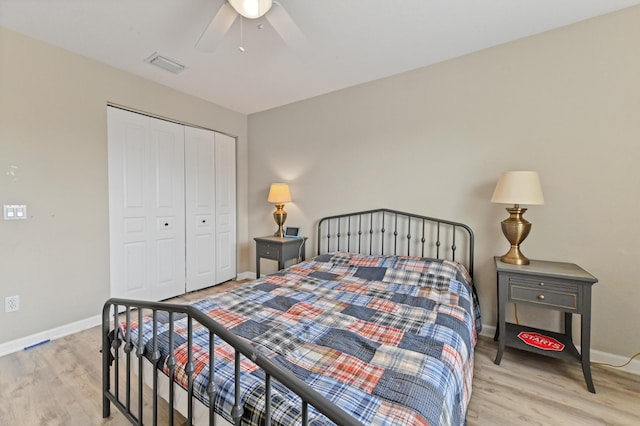 561 Peppergrass Run, Royal Palm Beach, FL 33411 - bedroom with wood finished floors, baseboards, a closet, and ceiling fan