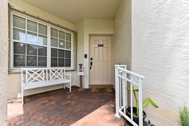 561 Peppergrass Run, Royal Palm Beach, FL 33411 - property entrance featuring stucco siding