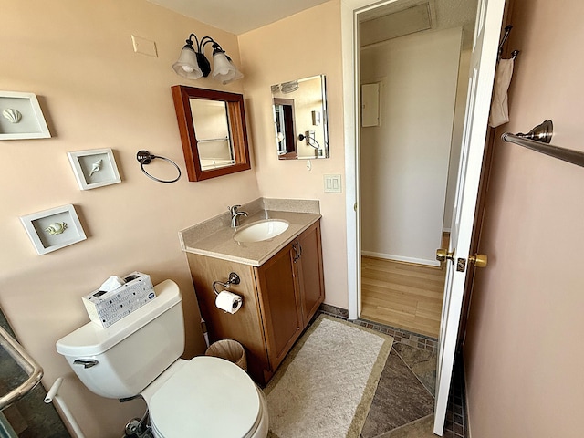 2060 Newport N, Deerfield Beach, FL 33442 - bathroom with toilet, vanity, and baseboards
