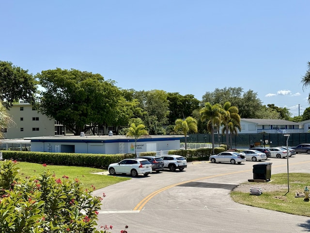 2060 Newport N, Deerfield Beach, FL 33442 - uncovered parking lot with fence