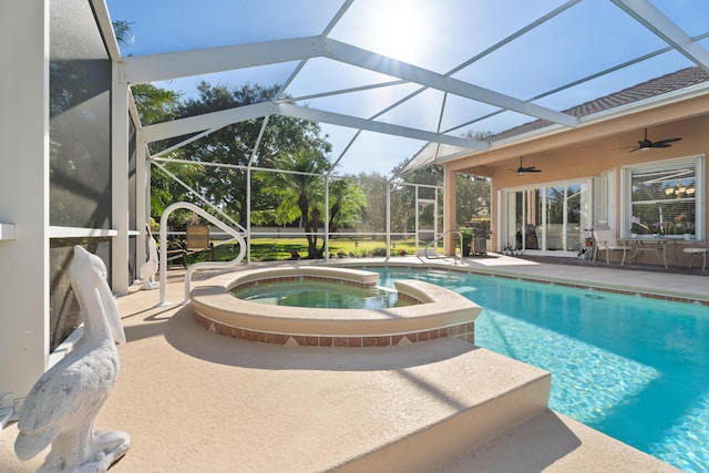 1629 SE Tradition Trce, Stuart, FL 34997 - view of swimming pool featuring ceiling fan, a patio, a pool with connected hot tub, and a lanai