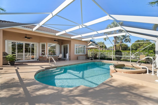 1629 SE Tradition Trce, Stuart, FL 34997 - view of swimming pool featuring ceiling fan, a patio area, a lanai, and a pool with connected hot tub